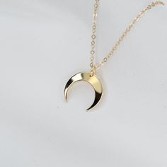 "14K Solid Gold Tiny Crescent Moon Necklace. 14K Gold Crescent Moon Necklace. Dainty Necklace This necklace is 14k solid yellow gold. The necklace will be shipped in a beautiful gift box. 14k gold tiny crescent moon charm is 1/2\", 22 gauge. 14K gold necklace is 1.2mm flat cable chain 14k gold components Please read our policies before you place your order. https://www.etsy.com/shop/SashJewelry/policy?ref=shopinfo_policies_leftnav To see other Mother daughter necklace set click here: https://www Dainty Crescent Gold Plated Necklace, Crescent Moon Charm Necklace In 14k Gold, 14k Gold Filled Crescent Moon Necklace, Gold Crescent Moon Charm Necklaces, Rose Gold Crescent Moon Charm Necklace, Gold Crescent Moon Necklace, Mother Daughter Necklaces Set, Crescent Moon Necklace Gold, Other Mother