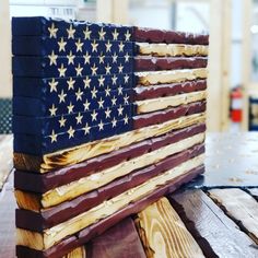 an american flag made out of wooden planks