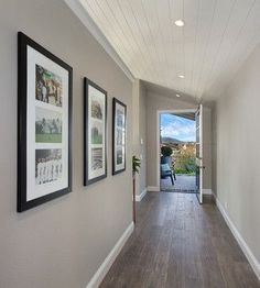 the hallway is clean and ready for us to use as an entrance way in this home