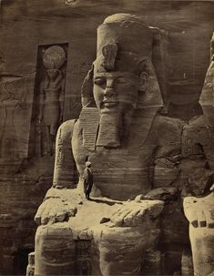 black and white photograph of an egyptian statue