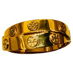 This is a Tory Burch 18K Rose Gold plated Hinged Bangle. It depicts a Tory Burch logo double wrap hinged bangle. Jewel Box, Hinged Bangle, 18k Rose Gold, Rose Gold Plates, Hinges, Or Rose, Tory Burch, Bangle Bracelets, Jewelry Bracelets