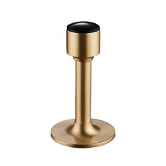 a brass colored toilet brush holder with a black top on a white background for use in the bathroom