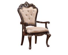 an ornate wooden arm chair with beige upholstered fabric seat and backrests