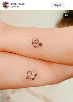 two small tattoos on the arms of women with flowers and crescents tattooed on them