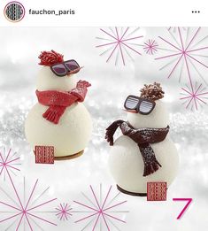 two snowmen with hats and scarfs on their heads, one is wearing sunglasses