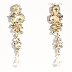 These Are Brand New Champagne Floral Scroll Flourish Glass Rhinestone Bead Dangle Earrings. They Feature Light Champagne Translucent Acrylic Pear Cut Rhinestone Flowers And Smaller Clear Acrylic Rhinestone Flowers, Light Champagne Faceted Teardrop Beads, Round Cut Clear Glass Rhinestone Details, And A Clear Glass Rhinestone Scroll Flourish On Gold Toned Metal And Studs. These Gorgeous Earrings Will Add A Floral Elegance To Your Wardrobe! So Beautiful And Sparkly In Person! 3" X 0.75" All Orders Bead Dangle Earrings, Ankle Chain, Teardrop Beads, Beaded Dangle Earrings, Rhinestone Bead, Feature Light, Cream And Gold, Beaded Dangles, Gorgeous Earrings