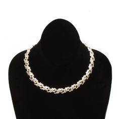 This vintage Italian sterling silver collar necklace features interlocking links.  The woven design appears in both silver and gold.  A photo is included of the necklace from the side to show how the links fold and move. Measurements:  approx 15-1/2" long (excluding the clasp tongue) x 1/2" wide. Weight:  the necklace weighs 31.3 grams, making it light weight and easy to wear any day of the year.   Marks:  the back of the clasp is stamped with the sterling number 925 and Italy. Excellent condition. H974 Take a look at my shop ~ Industrial Blonde.  There you will find more great antique and vintage treasures!   IndustrialBlonde.Etsy.com Anniversary Necklace With Figaro Chain Link, Box Chain Link Necklace For Anniversary, Formal White Chain Link Necklace, Anniversary Silver Chain Link Necklace, Elegant Silver Cuban Link Necklace For Anniversary, Silver Cuban Link Necklace For Anniversary, Gold Cuban Link Necklace With Silver Chain, Anniversary Silver Link Chain Necklace, White Link Necklace For Anniversary