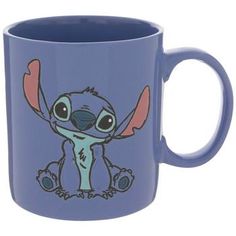 a blue coffee mug with an image of a cartoon character on the inside of it