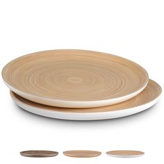 three wooden plates sitting on top of each other in front of a white background,