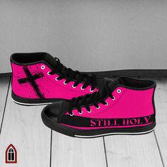 Introducing our brand new neon pink Ladies Christian High Top Sneakers! These trendy sneakers are perfect for anyone looking to express their faith in a unique and stylish way. The outside of both shoes features the inscription "Still Holy" as a nod to the new Christian Rap song from Indie Tribe. And, as an extra special touch, the inside of both shoes showcases a grungy paint splatter cross. These sneakers are not only fashionable, but also meaningful. They make a great gift for a variety of occasions including birthdays, Christmas, bachelorette parties, and more. Whether you're looking for a gift for a teen, a pastor, or a friend, these sneakers are the perfect choice. They're also great for sports teams, basketball teams, summer leagues, at-risk youth, youth groups, church groups, and c Christian Shoes, Cross Shoes, Neon Sneakers, Christian Rap, Streetwear Tshirt, Trendy Sneakers, Paint Splatter, Shoes Trainers, Tennis Shoes