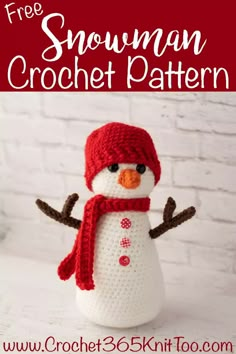 a crocheted snowman with a red hat and scarf