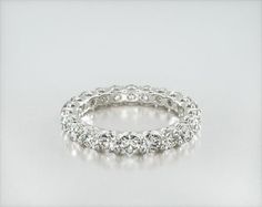 a white gold ring with round cut diamonds