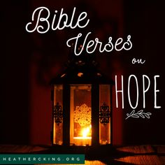 a lit candle with the words bible verses on hope in front of an image of a lantern