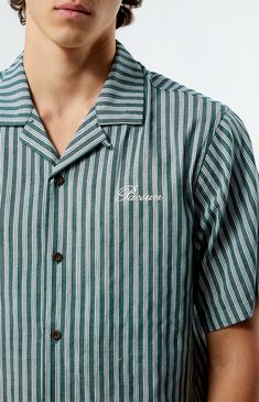 The Embroidered Stripe Camp Shirt from PacSun elevates your everyday style with its trendy design and comfortable cotton blend. Featuring a collared neckline, button closures, stripes, and an embroidered logo on the left chest, this regular fit shirt is a versatile addition to any wardrobe.   	Collared neckline 	Short sleeves 	Standard fit 	Button closures 	Left chest embroidery 	80% Cotton, 20% polyester 	Machine washable 	Model is wearings size medium 	Model Measurements: 6’1”  Height, 30” Waist, 35” Hips Clothing Men, Camp Shirt, Men Shirt, Camping Shirt, Embroidered Shirt, Everyday Style