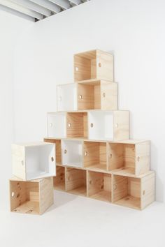 several wooden boxes stacked on top of each other