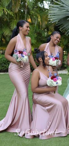 the bridesmaids are all dressed in pink dresses