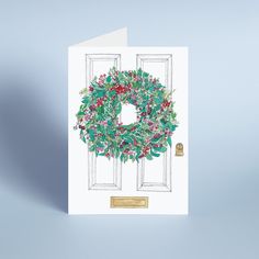 a white card with a wreath on the front door and two open doors behind it