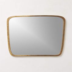 a mirror that is hanging on the wall