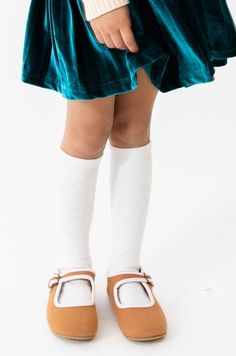 White knee high socks with lattice texture. One size fits most children. Socks measure 14.5 inches from top to bottom not stretched. Models shown wearing the socks are 3 and 6 years old. Email info@pepperkids.us with any sizing questions. Hand wash with like colors. Lay flat to dry.Do not iron.Do not bleach. All sales are final. Because our shop is small and our inventory is very limited we do not offer returns or exchanges. Please refer to item descriptions before ordering. Playful Fitted White Socks, White Knee-high School Socks, Fitted Non-slip White Socks, White School Socks, White Knee High Socks, White Lattice, Model Show, Knee High Socks, High Socks