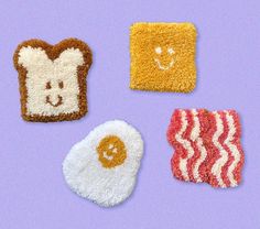 three toasted breads with different types of food on them