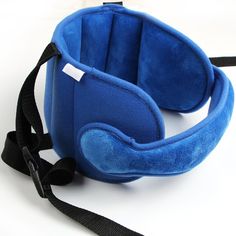 a blue neck pillow with black straps