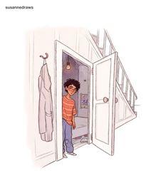 a boy standing in an open door to his bathroom