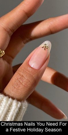 Looking for holiday nail inspiration? These Christmas nail ideas will have you glowing at the holiday party this year. Simple Art Nail Designs, Holiday Nails Simple Short, Cute Almond Nails Christmas, French Tip Nails Christmas Simple, Plain Christmas Nails Short, Christmas Nail Asthetic, Simple Nails New Years, Christmas Nail Minimalist