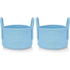 two blue round baskets sitting next to each other