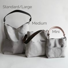 two bags are shown side by side, one has a shoulder strap and the other has a pocket