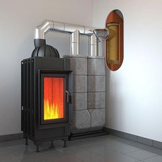 a stove that is sitting in the middle of a room next to a wall mounted heater