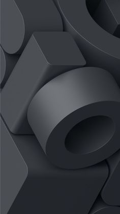 an abstract black and grey background with circles, rectangles, and squares on it