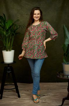 "🌷  RED JASMINE Add a splash of colour to your wardrobe with our Red Jasmine Tunic in vibrating hand block prints. Red Jasmine was created for a comfortable loose fit, and decorated with pintuck detailing at the front and back. Sizings Size S:   Shoulders 38cm - 14.9\" Bust  98cm - 38.5\" Length approx. 70cm - 27.5\" Size M:   Shoulders 39cm - 15.3\" Bust  100cm - 39.3\" Length approx. 70cm - 27.5\" Size L:   Shoulders 40cm - 15.7\" Bust  106cm - 41.7\" Length approx. 70cm - 27.5\" Size XL:   S Boho Kurti, Bohemian Kurti, Red Jasmine, Kurti Patterns, Short Kurti, White Bohemian, Casual Day Outfits, Indian Designer Outfits, Tunic Shirt