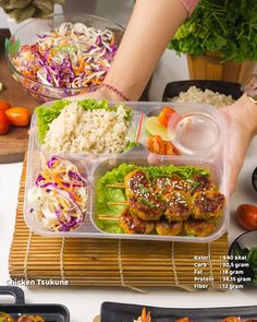 a plastic container filled with food on top of a table