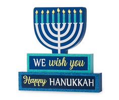 a hanukkah menorah with candles on it and the words, we wish you happy hanukkah