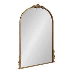 an ornate gold framed mirror on a white background