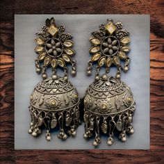 The Garni Oxidized earrings features an intricate design on Oxidized Silver with Kundan. This lightweight beauty is a perfect add to your collection Specifications Materials used: Oxidizes Silver, Kundan At Romikas, we pride ourselves on the craftsmanship and high quality of our jewelry, designed to enhance your natural beauty. Please contact us with any questions. Oxidized Earrings, Oxidized Silver, Intricate Design, Natural Beauty, Contact Us, High Quality, Silver, Beauty, Design