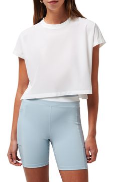 Whatever the activity, you'll play to win in this lightweight and boxy cropped T-shirt finished with side slits to ease your moves. Crewneck Short sleeves Side slits 80% nylon, 20% elastane Machine wash, tumble dry Imported White Crew Neck Crop Top For Sports, White Cropped T-shirt For Sports, White Cropped T-shirt For Summer In Athleisure Style, White Casual Crop Top Activewear, Casual White Crop Top Activewear, Casual White Moisture-wicking Crop Top, Sporty Boxy Fit Cropped T-shirt, White Crew Neck Crop Top For Workout, Sporty White Short Sleeve Crop Top