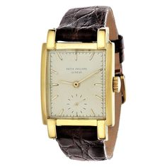 Introduction: Patek Philippe 2443J rectangular shaped watch measuring 40 x 26 mm, and made in 18K yellow gold. The watch is fitted with 9"-90 caliber 18-Jewel movement #975106 case # 511188. The watch was made in 1953 and is accompanied with an extract certificate from the archives confirming its date of manufacture and further sale in 1953. Further the watch is fitted with an brown crocodile strap. and original factory spring bars holding the strap on the case. Essay: Production of the referenc Rectangular Watch, Art Deco Watch, Tank Watch, Patek Philippe Watches, Vintage Rose Gold, Pendant Watches, White Band, Rose Gold Watch, Square Watch