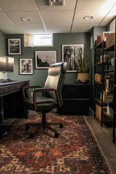 an office with a desk, chair and pictures on the wall