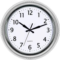 a round clock with black numbers on the face