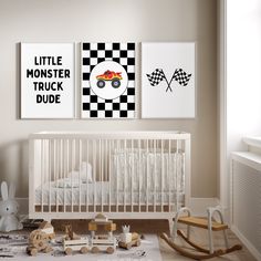 a baby's room with two posters on the wall and a crib in front of it