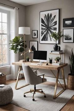 a home office with plants and pictures on the wall