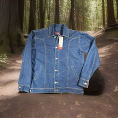 This Mark David Denim Jacket Is A Versatile Piece Suitable For Both Casual And Workwear Occasions. Made Of Lightweight And Unlined Cotton Material, It Features A Button Closure And A Spread Collar. The Jacket Is A Size 42, With A Regular Fit And Denim Fabric Type. The Blue Jacket Has Accents Of Buttons, With A Solid Pattern And A Chest Size Of 42 Inches. It Is A Vintage Piece, With A Chore Coat Style And A Belle Character Theme. The Jacket Is Suitable For Walking Activities In Fall And Winter Se Fitted Denim Outerwear For Outdoor, Retro Medium Wash Outerwear With Button Closure, Retro Denim Blue Outerwear With Button Closure, Retro Denim Jacket With Snap Buttons For Streetwear, Retro Medium Wash Button-up Outerwear, Retro Button-up Denim Outerwear, Retro Denim Jacket With Snap Buttons, Classic Outdoor Denim Jacket With Pockets, Retro Denim Outerwear With Snap Buttons