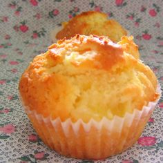 two muffins sitting on top of a table