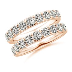 two rose gold wedding rings with diamonds on each side and one diamond set in the middle