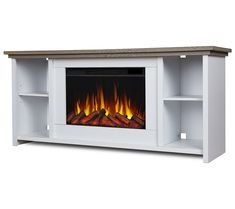 a white entertainment center with an electric fire in the fireplace and shelves on both sides