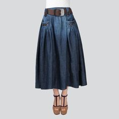 This season. set your style ablaze with our 2023 Summer Collection's City Style Fit & Flare Elongated Jeans Skirt. With its dark wash. high-waisted silhouette and rubber closure. you'll be ready to take on any summer adventure with effortless grace and classic sophistication.Why This Skirt Is a Summer Must-HaveBe it a romantic summer stroll or a urban night-out. this skirt is the epitome of fashion-retro chic. Its dark wash denim fabric guarantees unparalleled comfort. while the high-waisted sil Long Jeans Skirt, Womens Denim Skirts, Urban Trends, Jeans Skirt, Long Jeans, Skirts Online, Style And Grace, City Style, Skirt Design