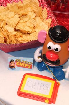 a close up of a plate of chips and a bowl of chips