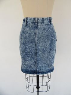 80s or perhaps 90s CONTEMPO CASUALS high waist stone washed denim skirt. 100% cotton. Made in USA. Brass zipper on left side. Belt loops. No pockets.  Label size X5, fits like XS Please compare measurements to  a similar garment that fits you well Measured flat 24" waist  35" hips 18" length  Good vintage condition with minimal signs of use and age. High Waist Cotton Mini Skirt With Lining, Medium Wash Cotton Mini Skirt With Pockets, Medium Wash Cotton Mini Skirt, Short Denim Blue Cotton Mini Skirt, Short Dark Wash Cotton Denim Skirt, Cotton Mini Skirt In Medium Wash, Short Length Cotton Mini Skirt In Medium Wash, Medium Wash Cotton Mini Denim Skirt, Fitted Stonewashed Denim Bottoms