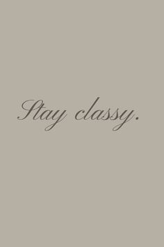 the words stay classy are written in cursive writing on a gray background